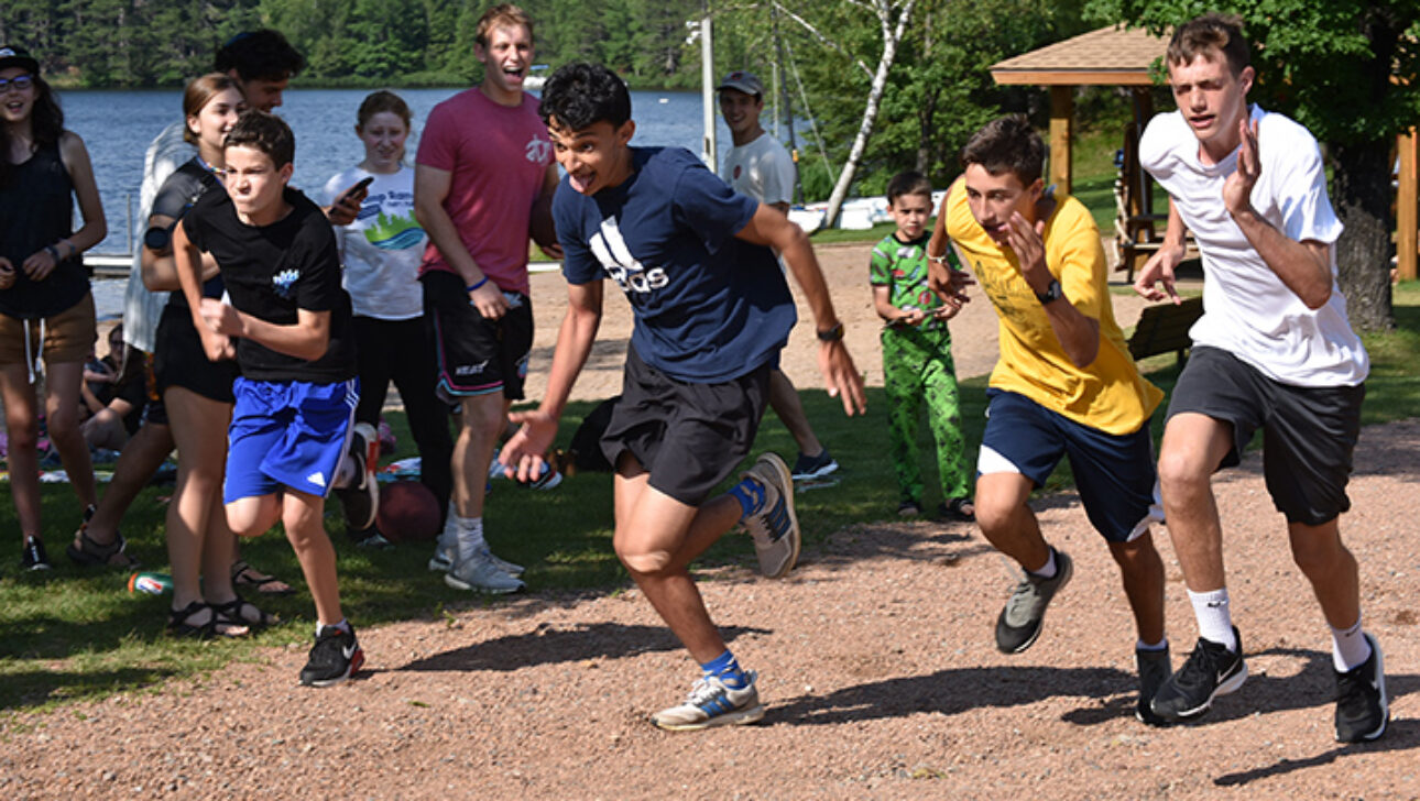 A group of campers running.