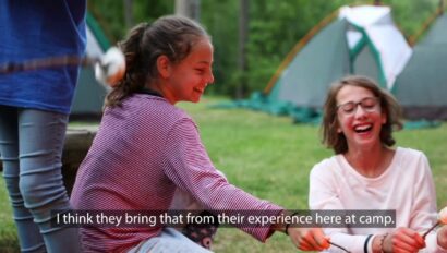 Two campers smiling.