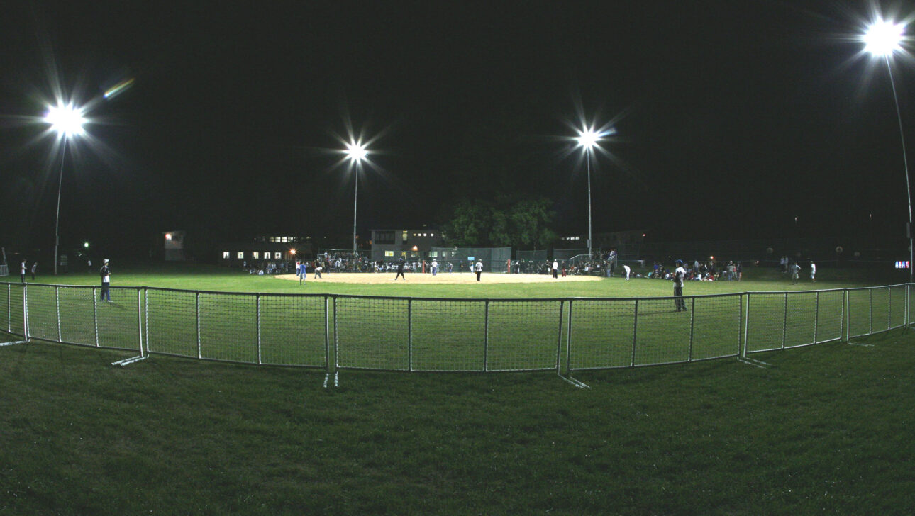 A baseball field at night.